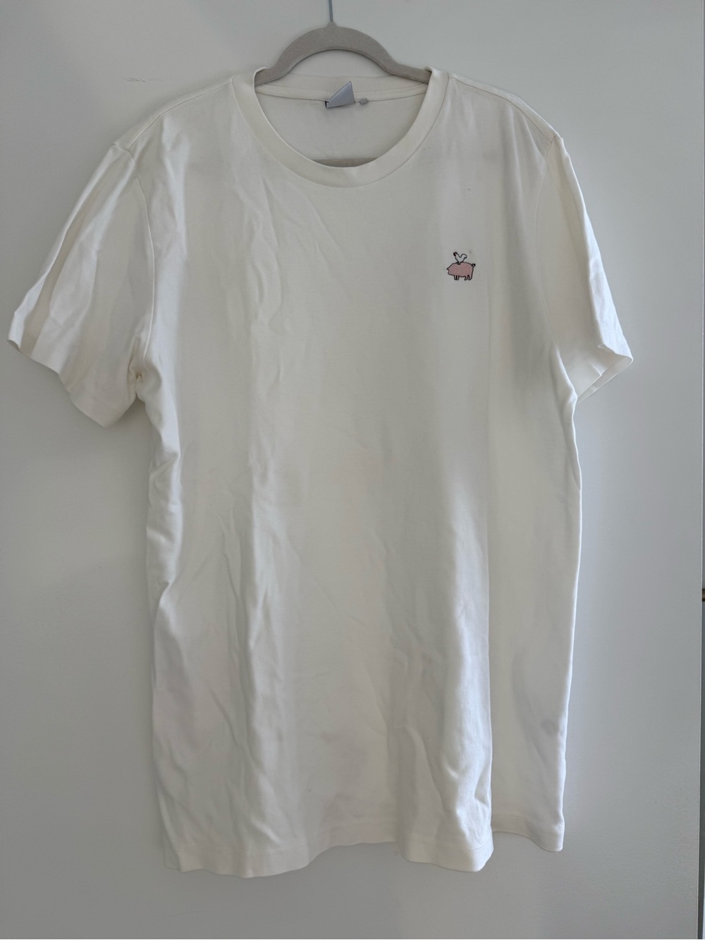 Men's White Crewneck Tee with Pink Embroidered Icon